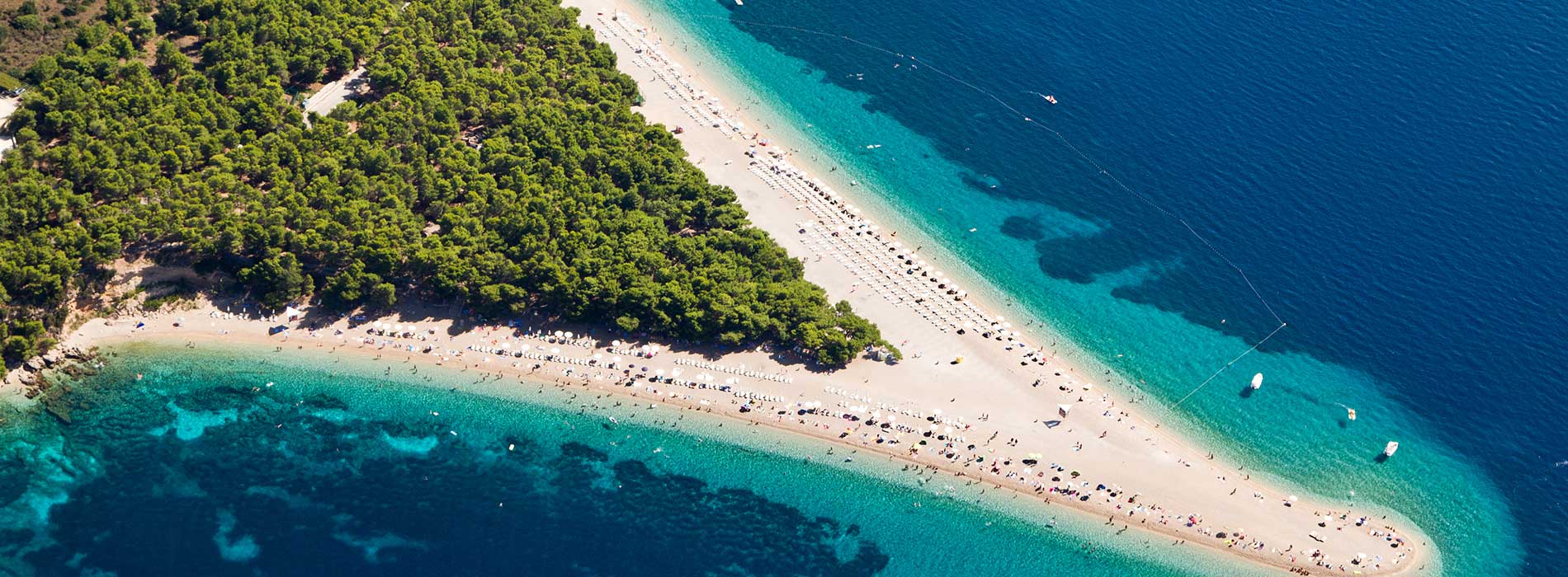 Aerial photograph of famous Zlatni Rat beach in Bol, Brac Island.jpg